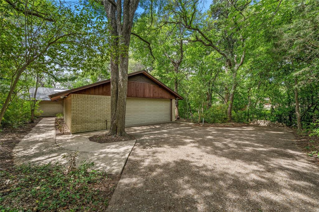 7821 Tallahassee Road Woodway, TX 76712 - Photo 26 of 31 a view of a house with a yard
