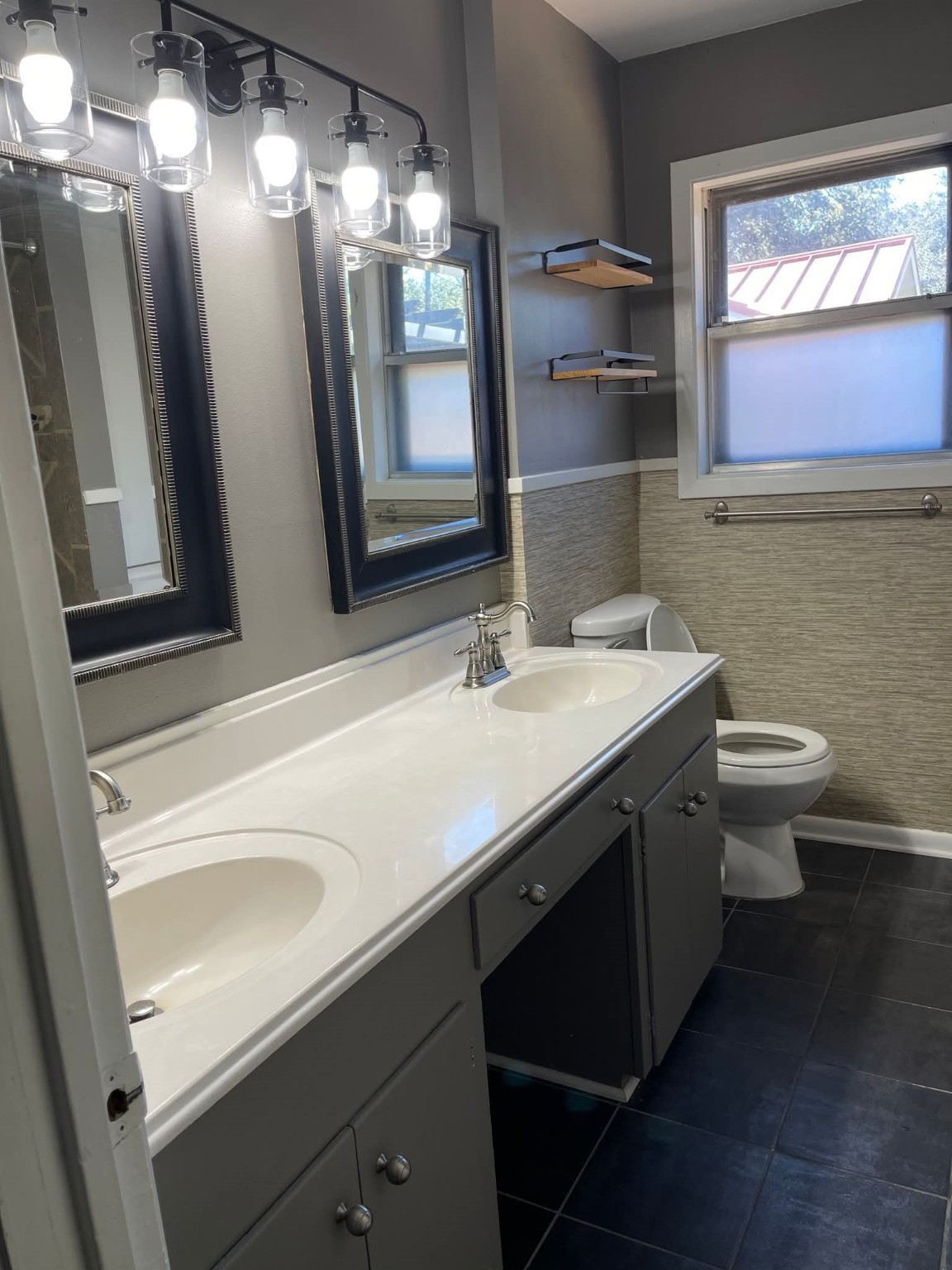 2305 Linwood Lane Bay City, TX 77414 - Photo 5 of 13 a bathroom with a sink toilet and a mirror