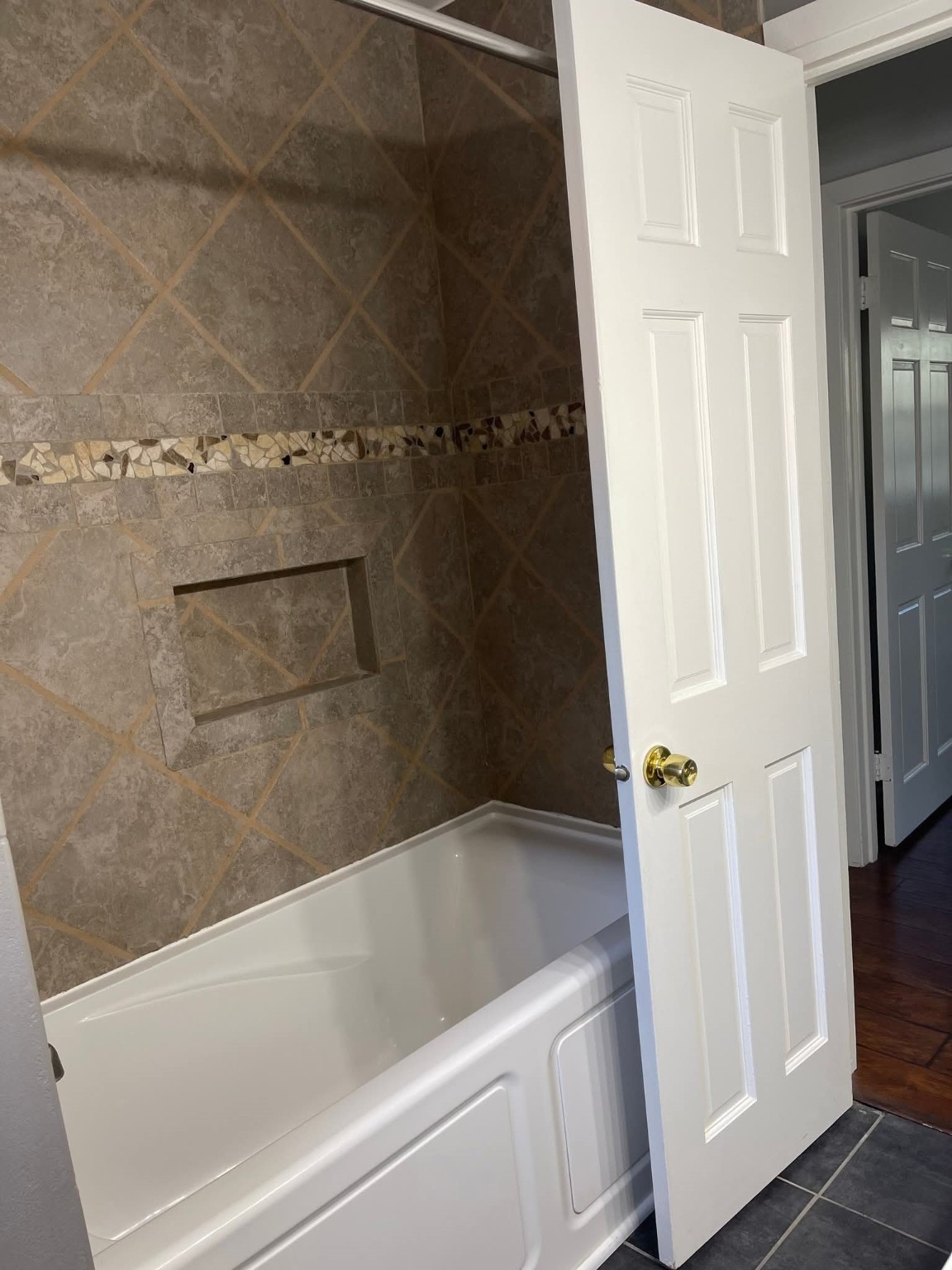 2305 Linwood Lane Bay City, TX 77414 - Photo 6 of 13 a bathroom with a bathtub
