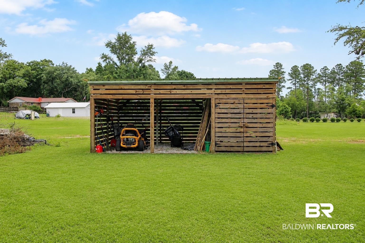 9825 Wolf Creek Ridge Elberta, AL 36530 - Photo 69 of 76 Wooden utility shed with a metal roof and two open bays