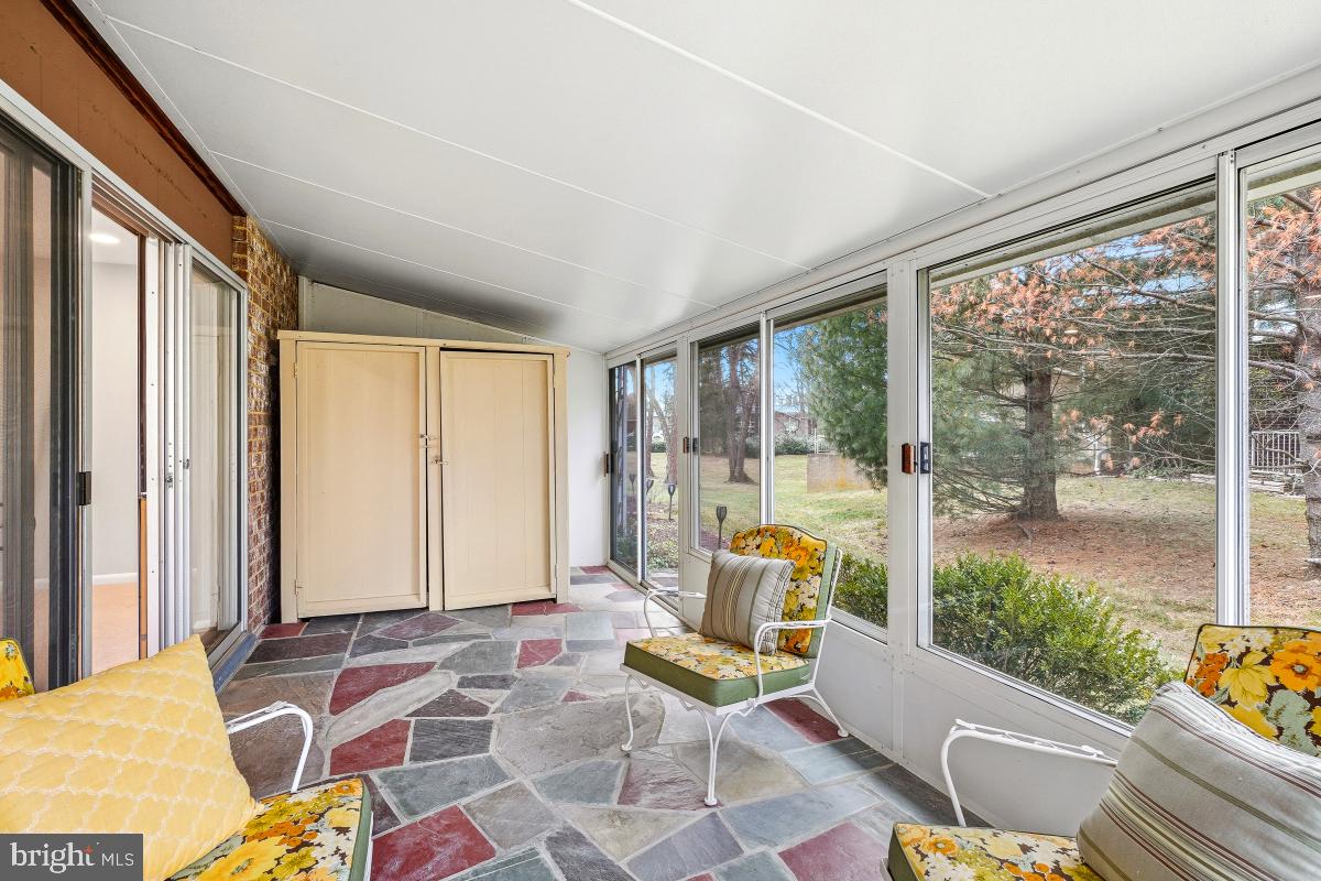 3436 Chiswick Court, Unit 45H Silver Spring, MD 20906 - Photo 20 of 30 a building outdoor space with patio furniture