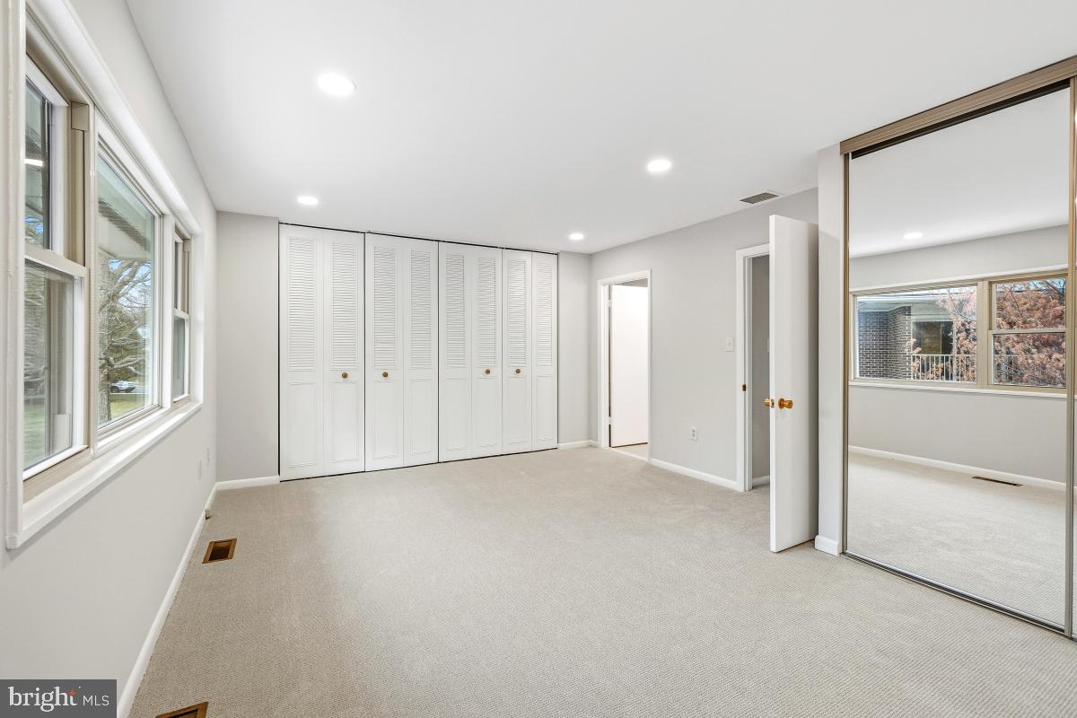 3436 Chiswick Court, Unit 45H Silver Spring, MD 20906 - Photo 24 of 30 a view of an empty room with a window