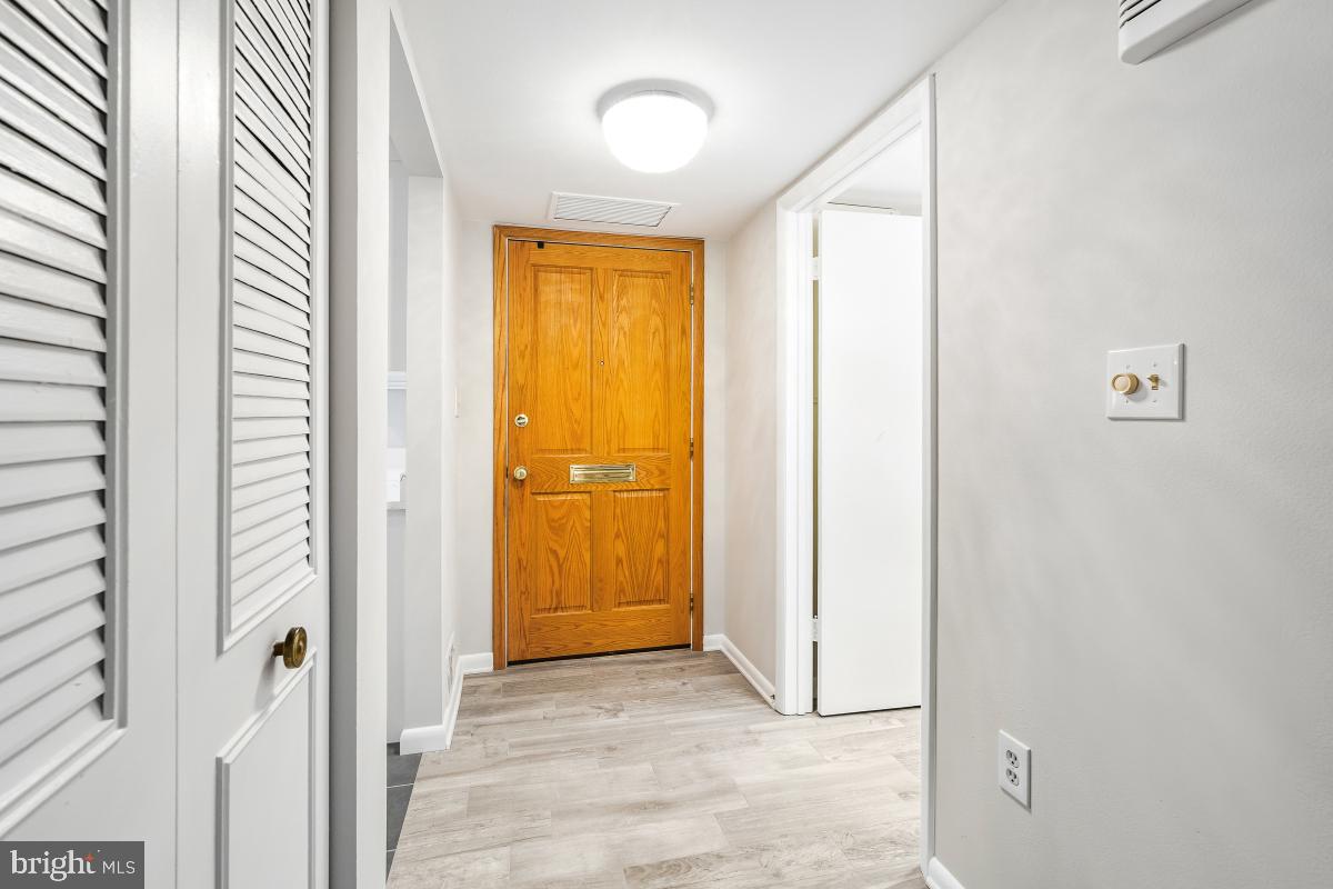 3436 Chiswick Court, Unit 45H Silver Spring, MD 20906 - Photo 4 of 30 a view of a bathroom with a door
