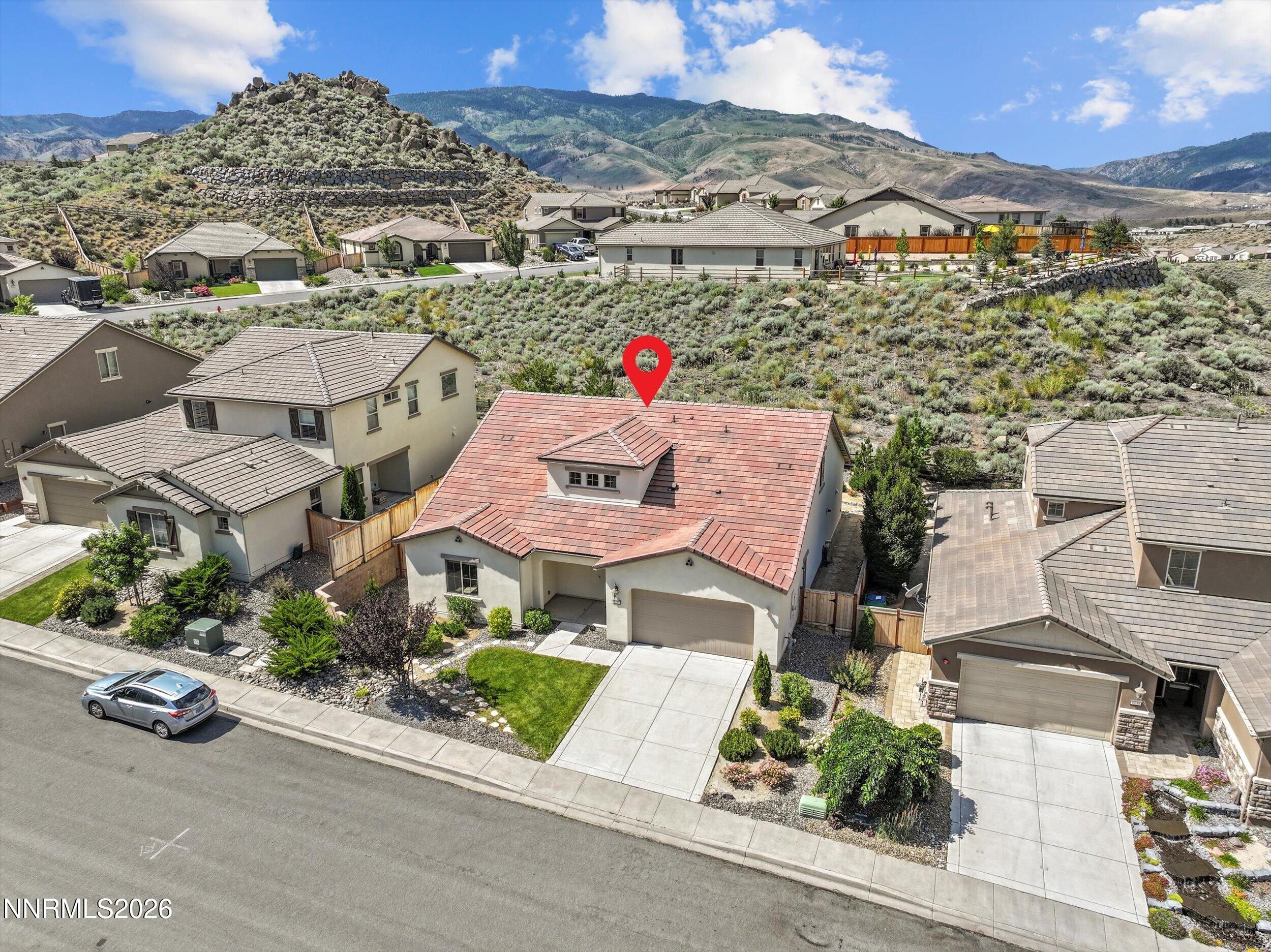 1725 Verdi Vista Court Reno, NV 89523 - Photo 32 of 37 an aerial view of multiple houses with a street