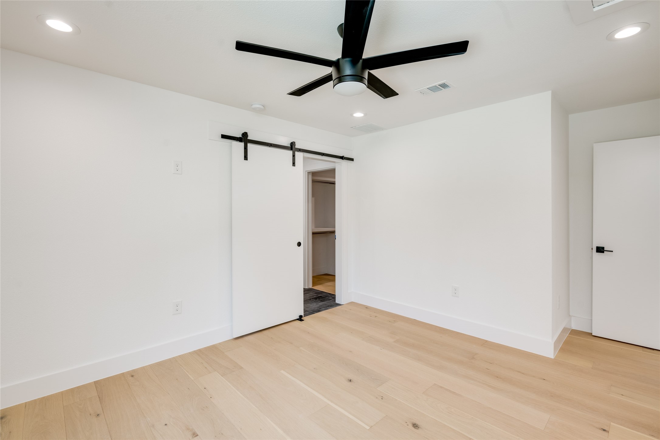 1928 Miles Avenue, Unit 1 Austin, TX 78745 - Photo 15 of 28 a view of a room with a sink and a white cabinet