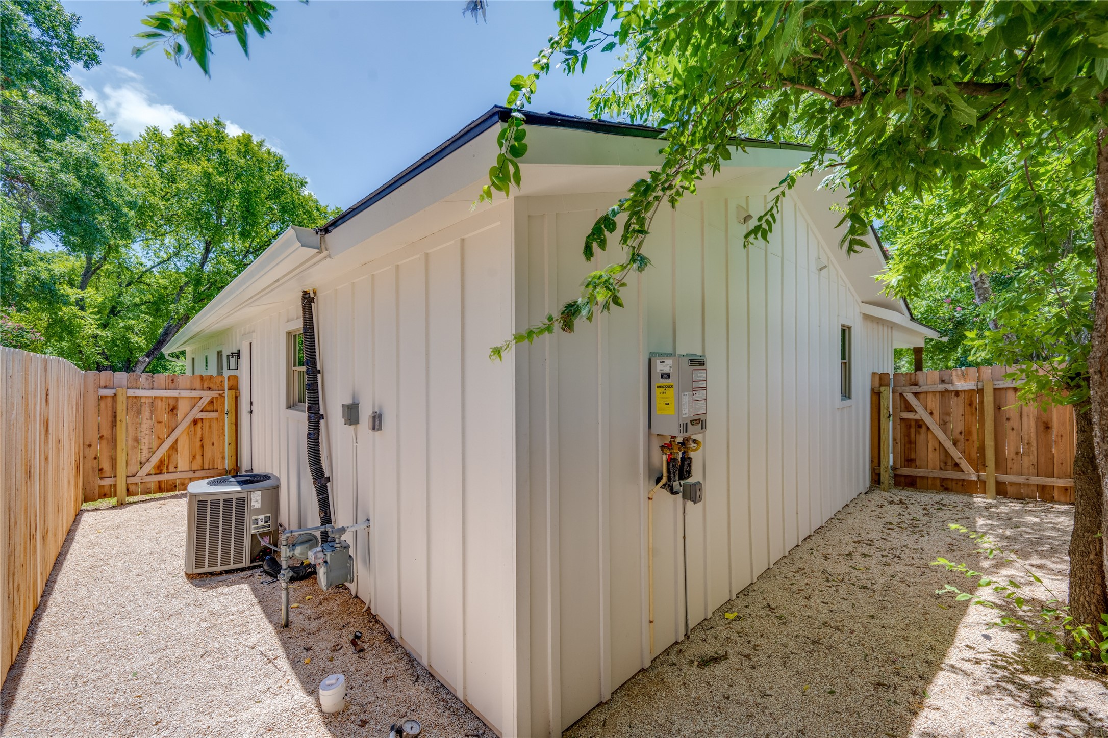1928 Miles Avenue, Unit 1 Austin, TX 78745 - Photo 28 of 28 a view of a house with backyard and wooden fence