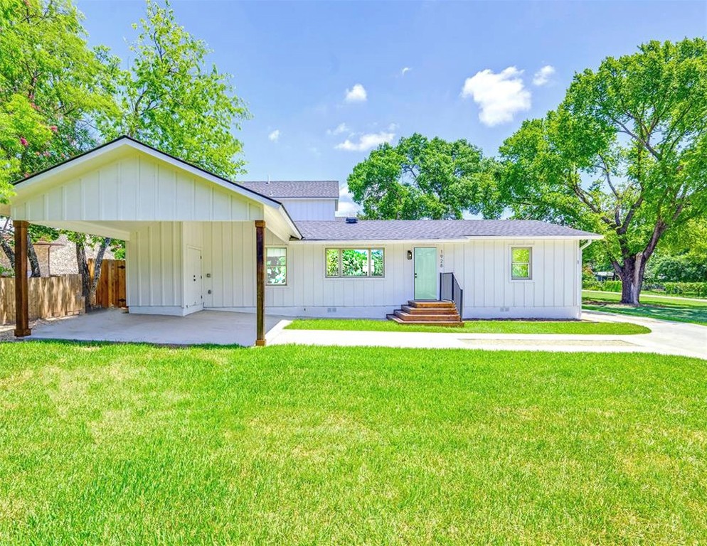 1928 Miles Avenue, Unit 1 Austin, TX 78745 - Photo 3 of 28 a view of a house with pool and a yard