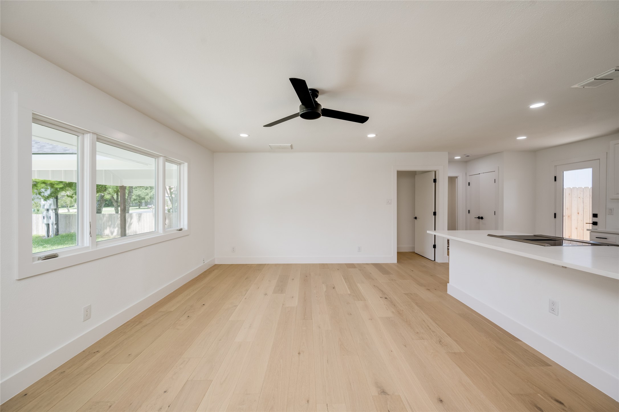 1928 Miles Avenue, Unit 1 Austin, TX 78745 - Photo 4 of 28 a view of an empty room with a window