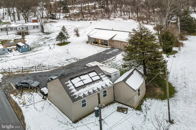 a view of a garage with parked cars