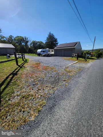 a view of an ocean from a yard