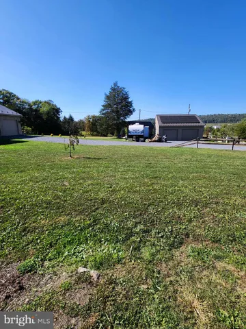 a view of an outdoor space and swimming pool