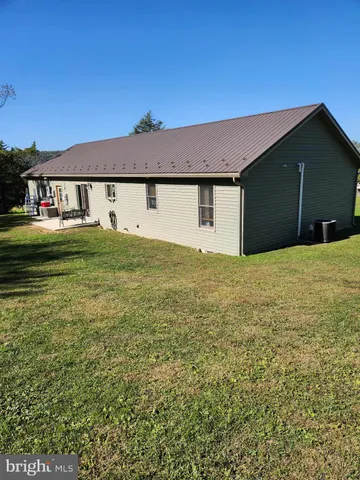 a view of a backyard with plants
