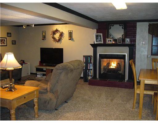 137 York Way Monaca, PA 15061 - Photo 12 of 18 Family Room. This family room is HUGE, there is room for two seating areas, gas fireplace, and additional space for a table. Walk out to patio, full bath, and laundry area. (see next picture)