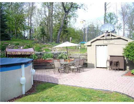 137 York Way Monaca, PA 15061 - Photo 15 of 18 Exterior Back. Paved back patio, close to pool and within view ofjungle gym! Fenced in yard, invisible fence for the pooch, and plenty of room for summertime entertaining!