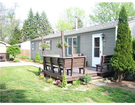 137 York Way Monaca, PA 15061 - Photo 17 of 18 Exterior Back. Back deck, new screen door, new plants and flowers!