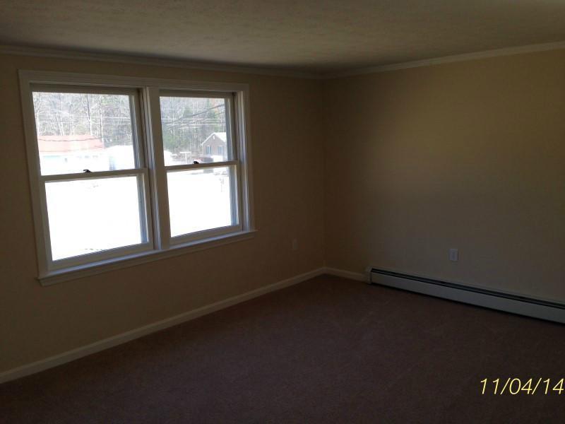 82 Sawyer Road Scarborough, ME 04074 - Photo 5 of 15 Living Room. New paint and carpet.