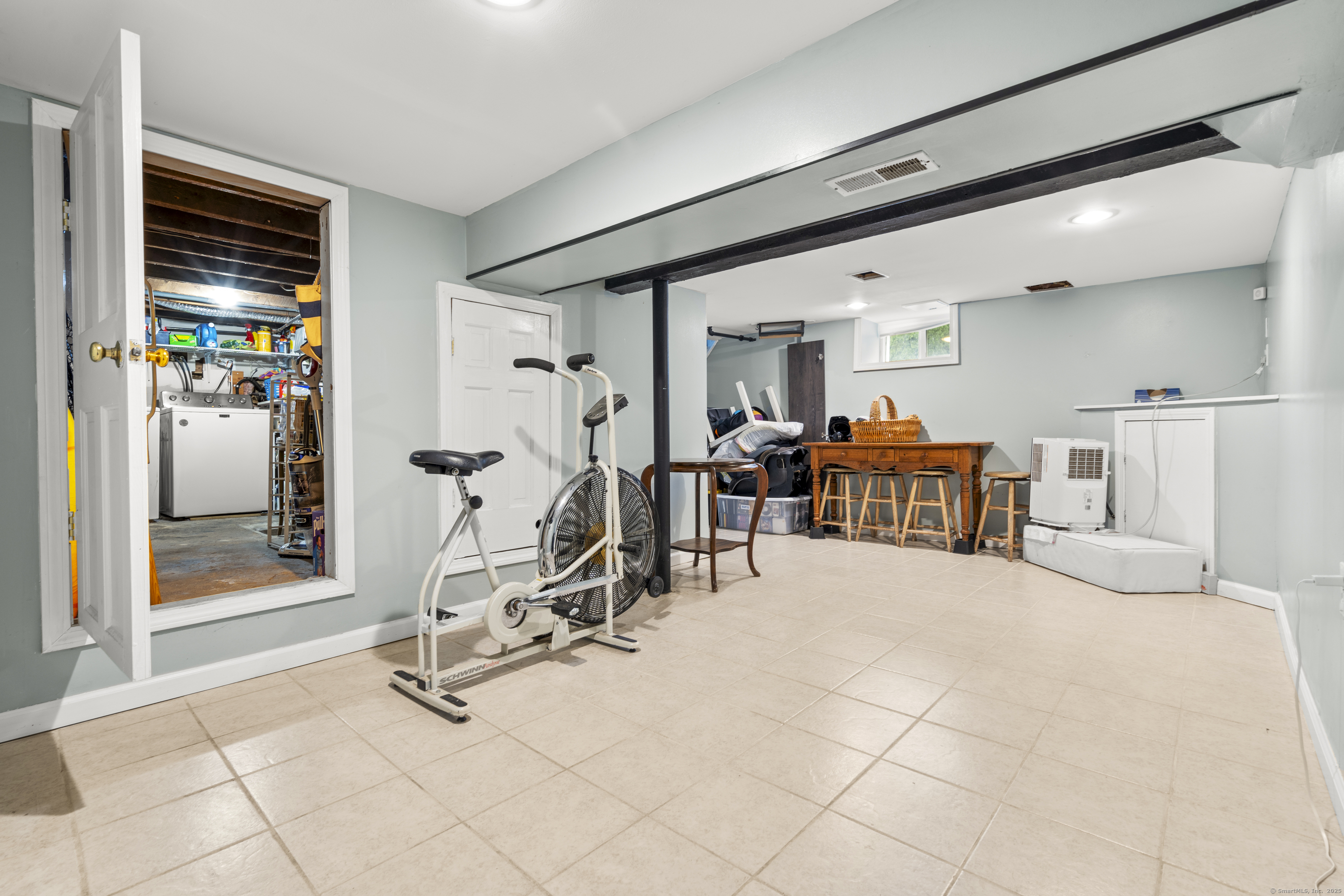 709 Tunxis Hill Road Fairfield, CT 06825 - Photo 24 of 30 a view of a room with gym equipment