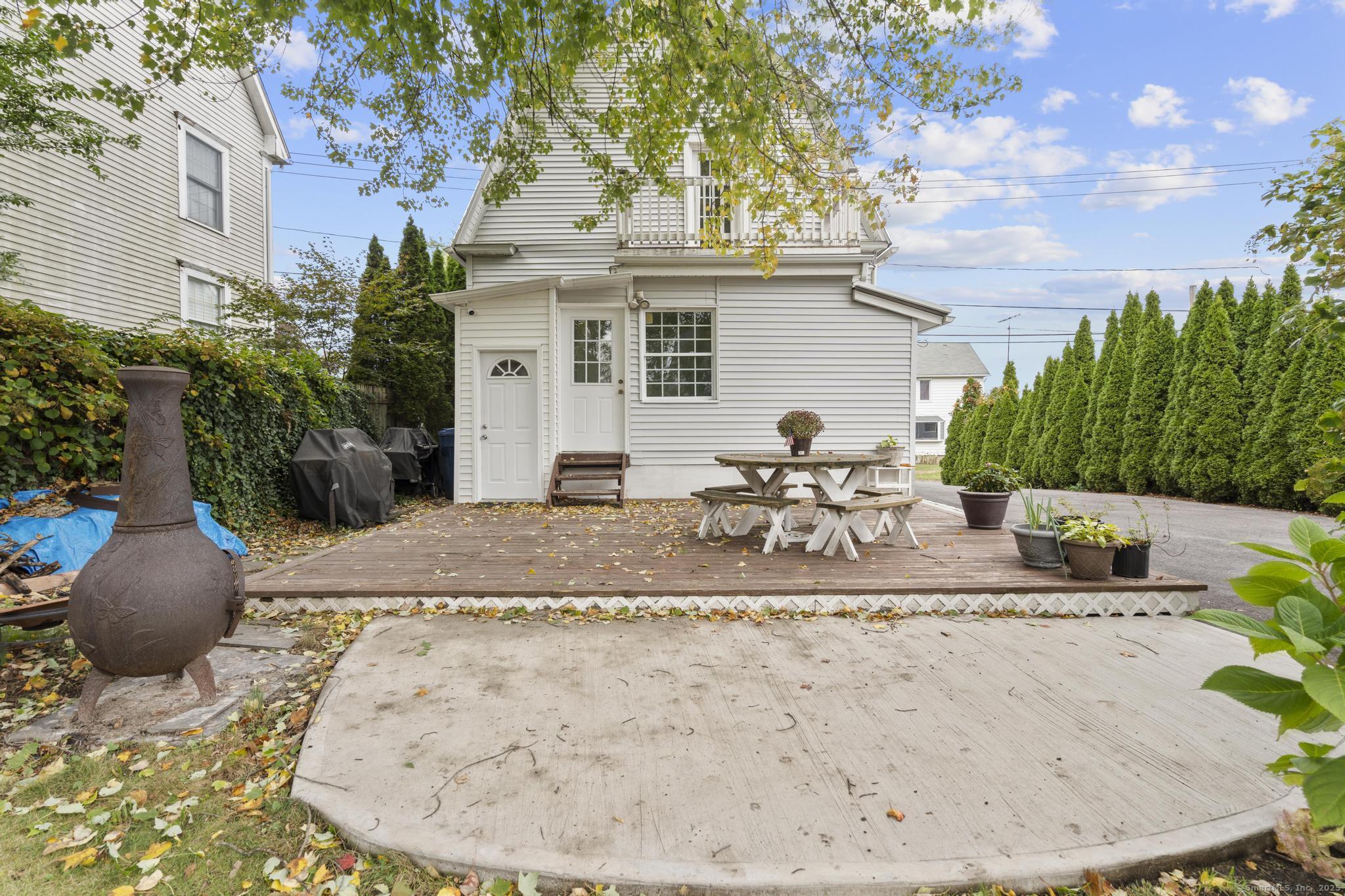 709 Tunxis Hill Road Fairfield, CT 06825 - Photo 27 of 30 a view of a house with backyard