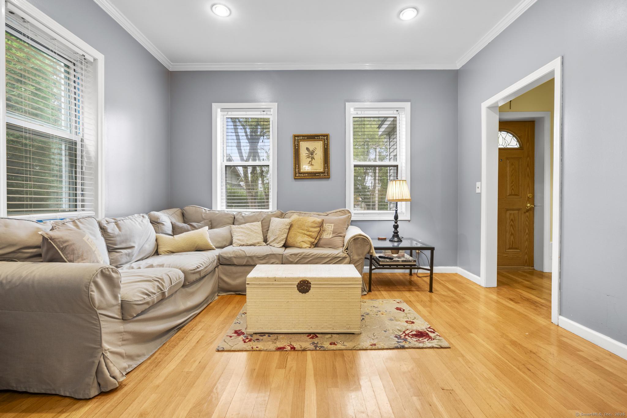 709 Tunxis Hill Road Fairfield, CT 06825 - Photo 5 of 30 a living room with furniture and a window