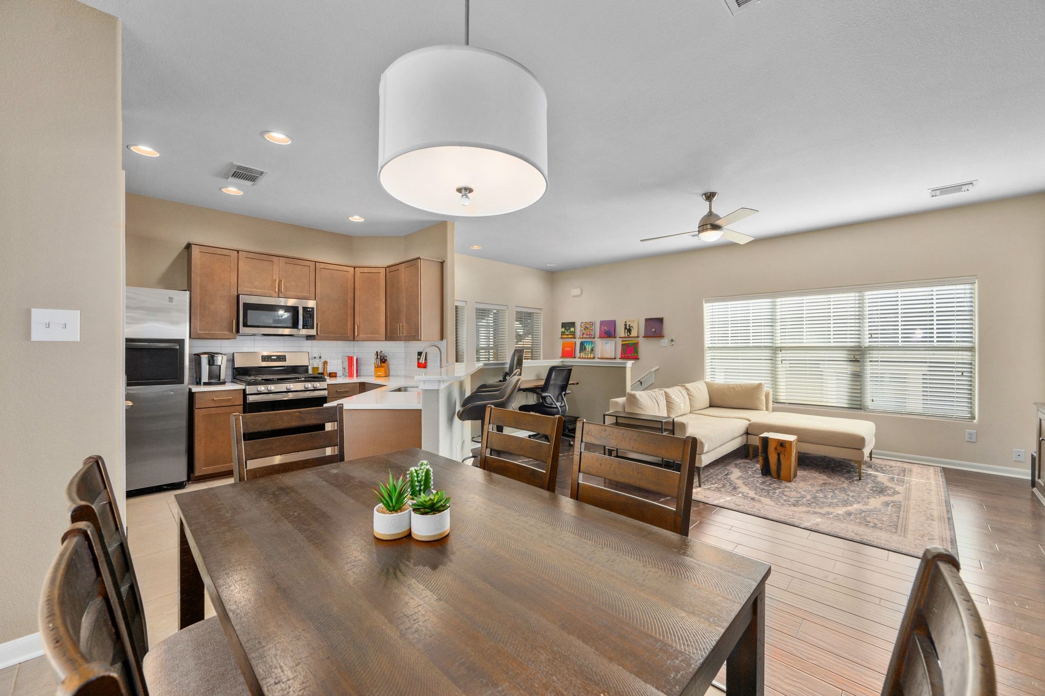 2905 Saville Loop Austin, TX 78741 - Photo 11 of 30 a living room with stainless steel appliances furniture a couch and a large window