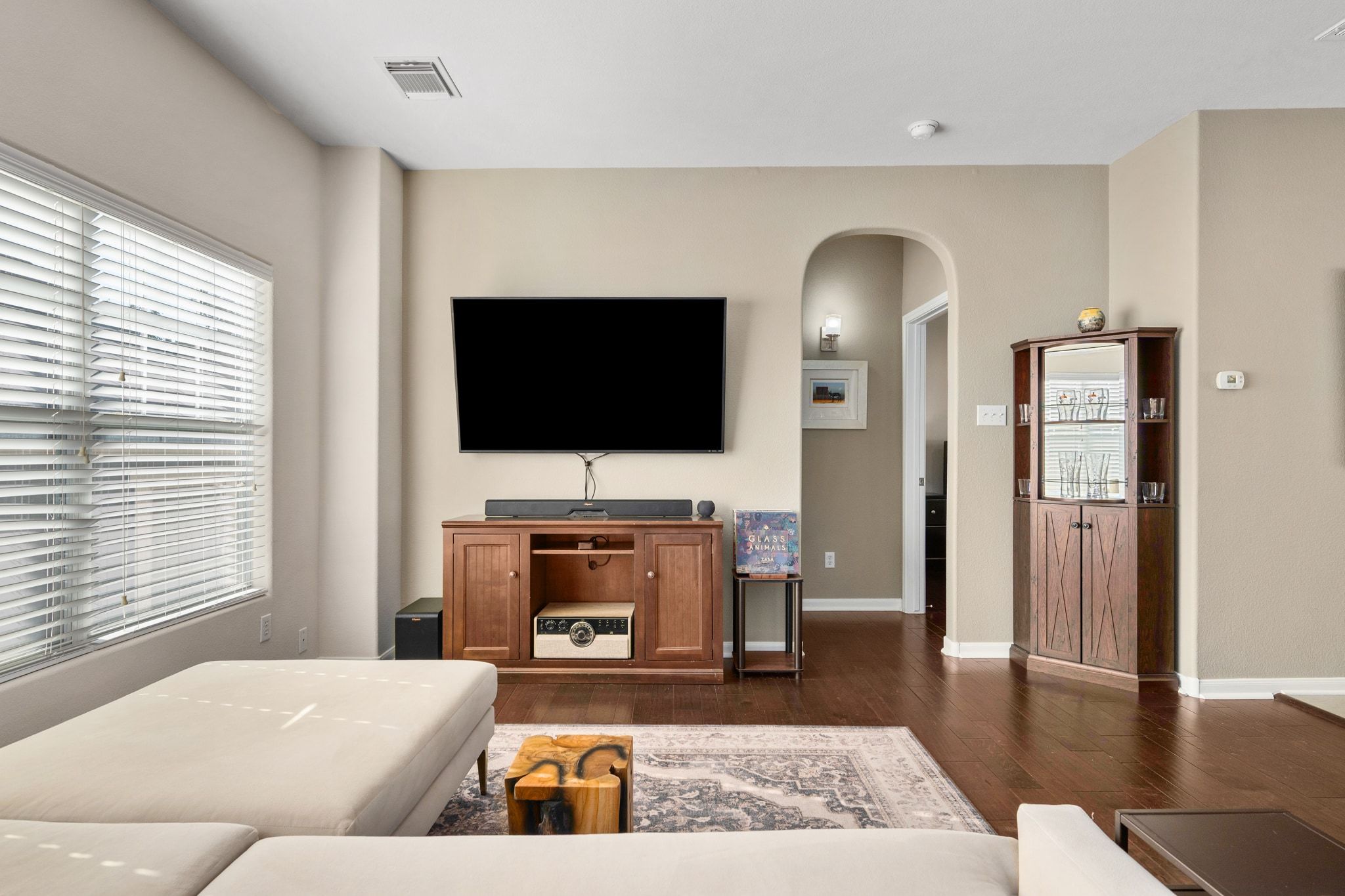 2905 Saville Loop Austin, TX 78741 - Photo 6 of 30 a living room with furniture and a flat screen tv