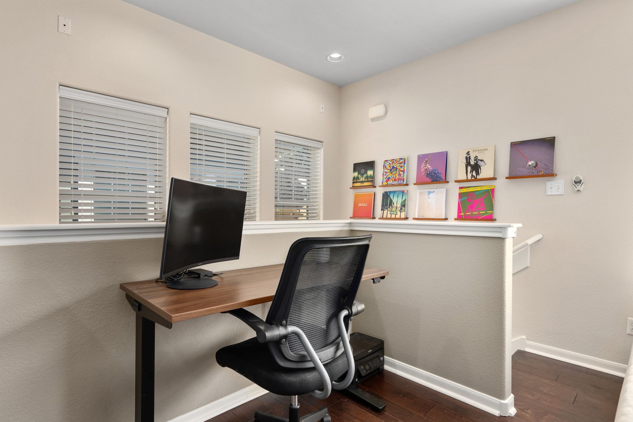2905 Saville Loop Austin, TX 78741 - Photo 7 of 30 a view of a workspace with furniture and a window