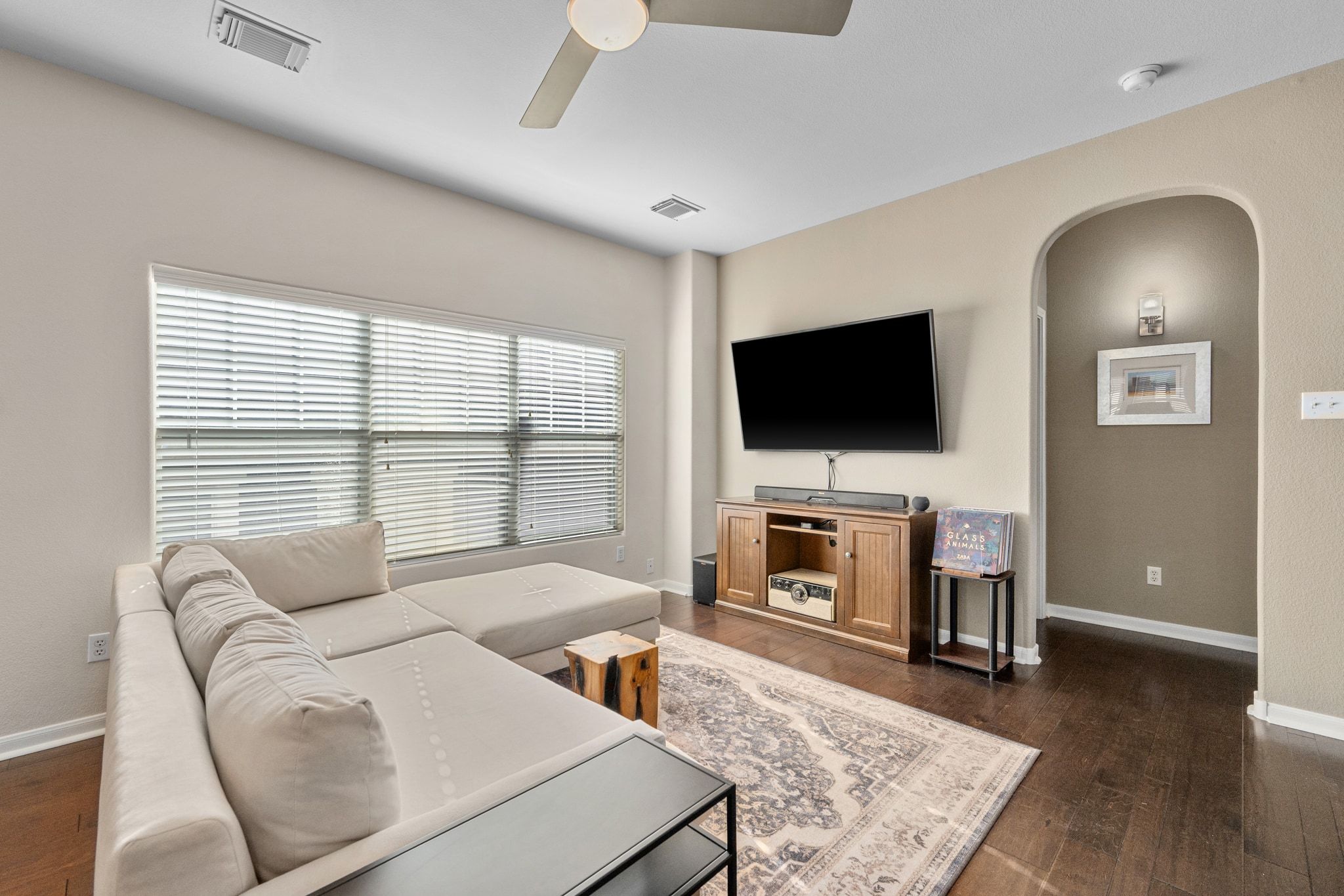 2905 Saville Loop Austin, TX 78741 - Photo 8 of 30 a living room with furniture and a flat screen tv