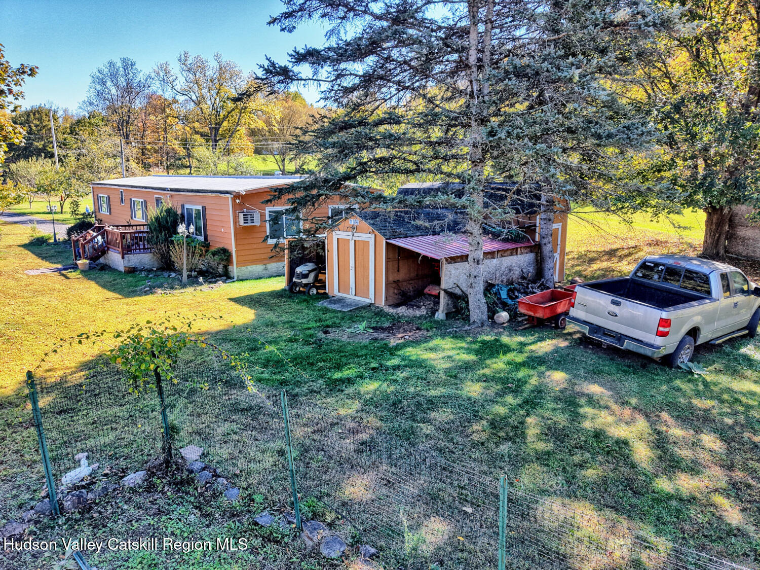 626 Bross Street Cairo, NY 12413 - Photo 67 of 78 a view of a house with a yard porch and sitting area