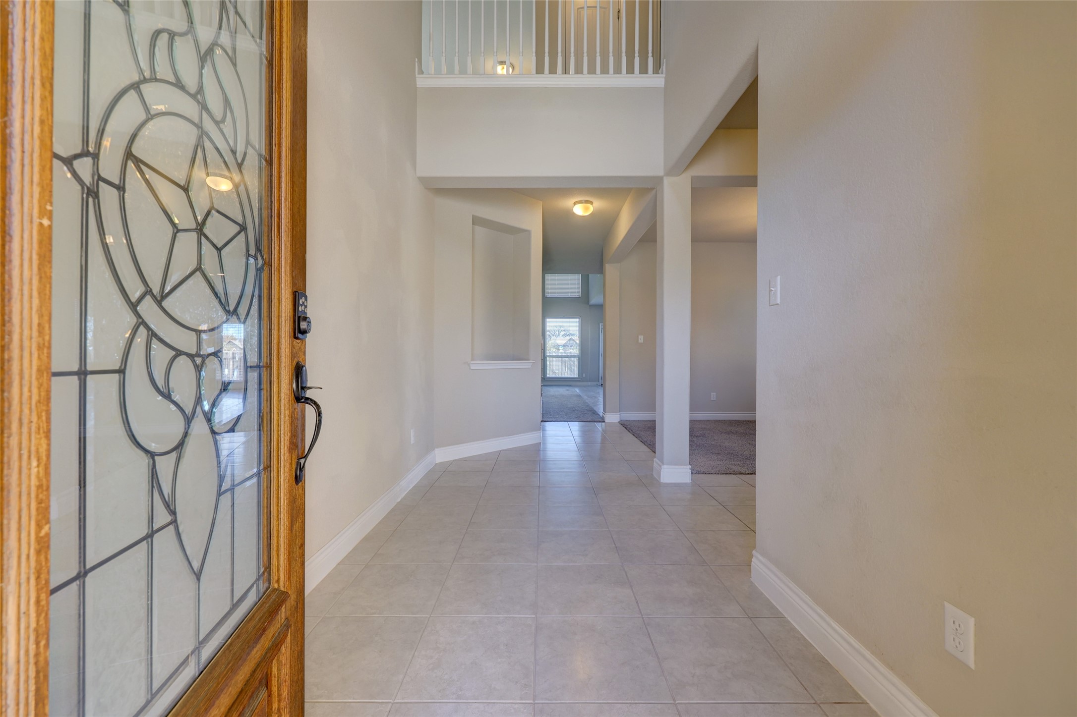 431 Millard Street Georgetown, TX 78628 - Photo 3 of 36 Foyer with baseboards and light tile patterned floors