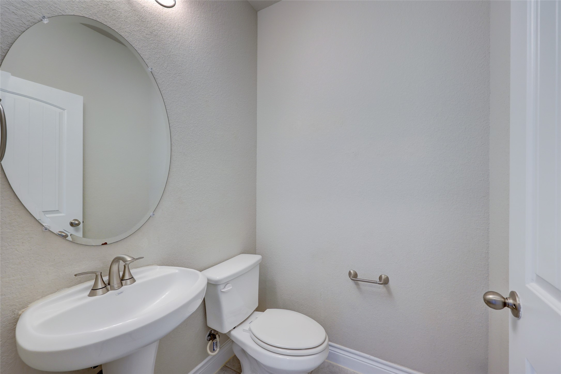 431 Millard Street Georgetown, TX 78628 - Photo 9 of 36 Half bath with a textured wall