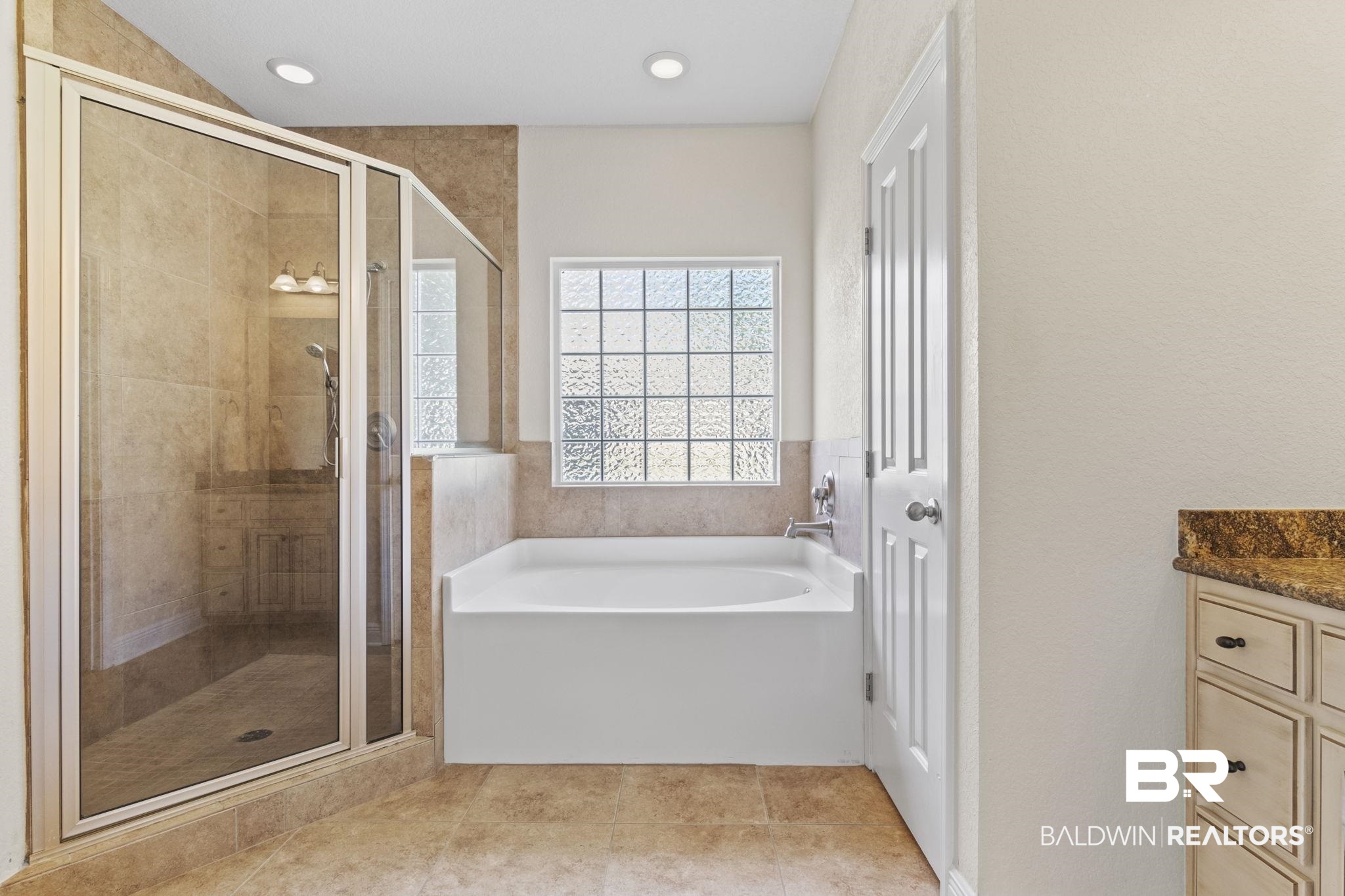 8664 Foxtail Loop Pensacola, FL 32526 - Photo 36 of 64 Full bathroom with a bath, a shower stall, vanity, tile patterned floors, and recessed lighting