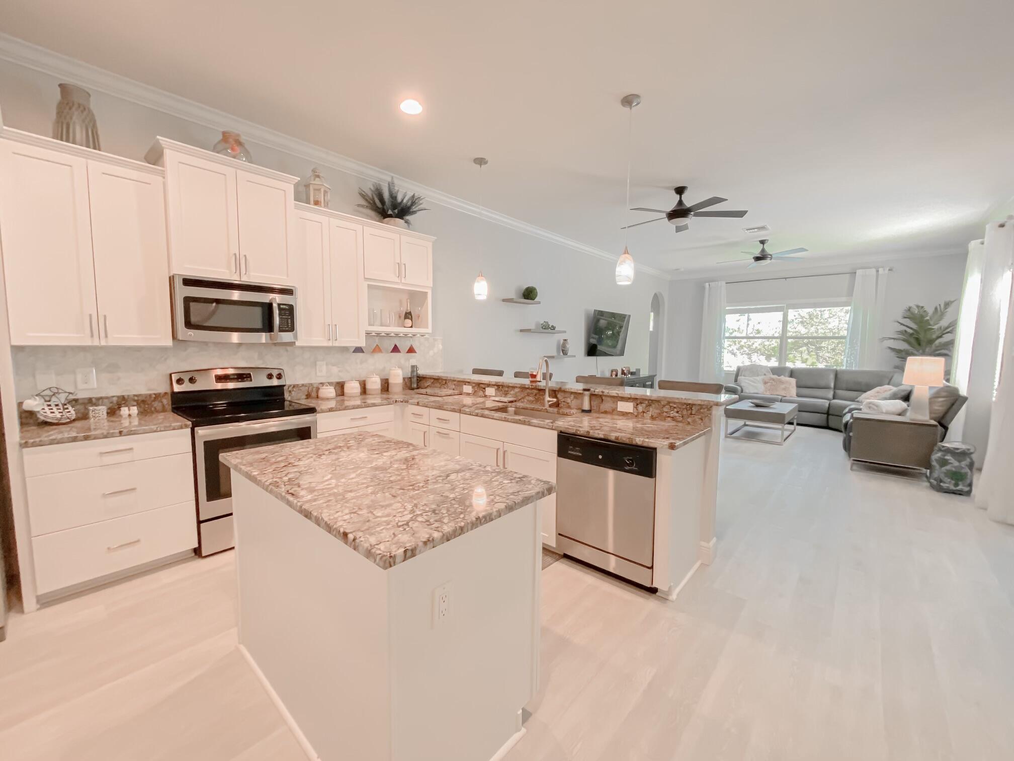 235 Northeast Abaca Way Jensen Beach, FL 34957 - Photo 7 of 29 ren 35