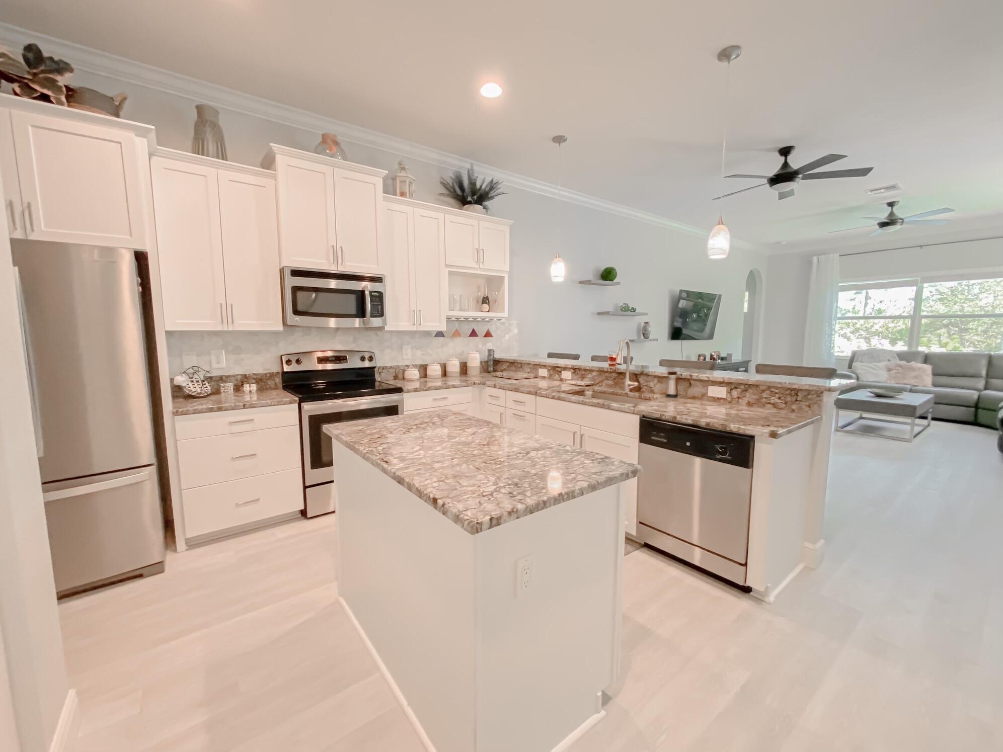 235 Northeast Abaca Way Jensen Beach, FL 34957 - Photo 9 of 29 ren 36