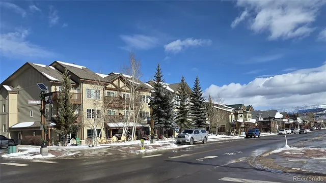 a view of a street with cars