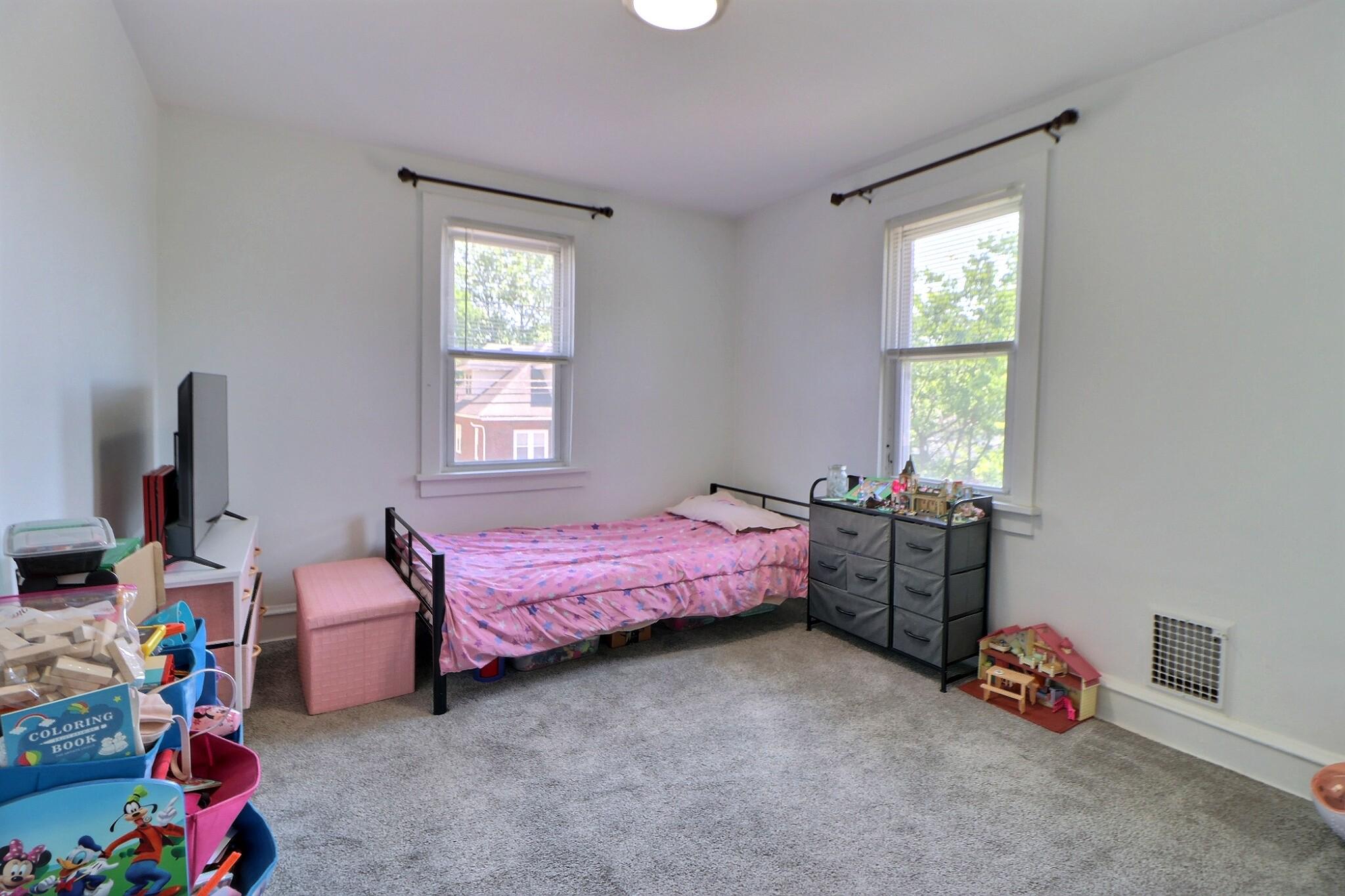 1022 Penn Line Road Paulsboro, NJ 08066 - Photo 17 of 19 a bedroom with bed and a window
