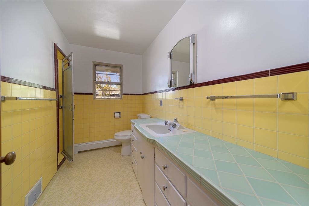 604-26 26 1/2 Road Grand Junction, CO 81506 - Photo 18 of 21 a bathroom with a sink and mirror