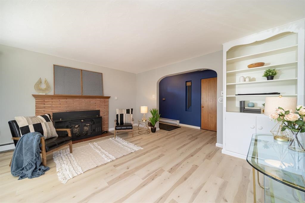 604-26 26 1/2 Road Grand Junction, CO 81506 - Photo 5 of 21 a living room with furniture and a fireplace