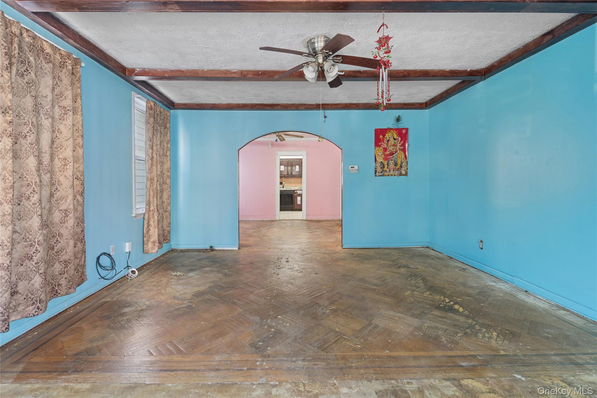 62-82 Booth Street Queens, NY 11374 - Photo 2 of 9 a view of a windows and a ceiling fan