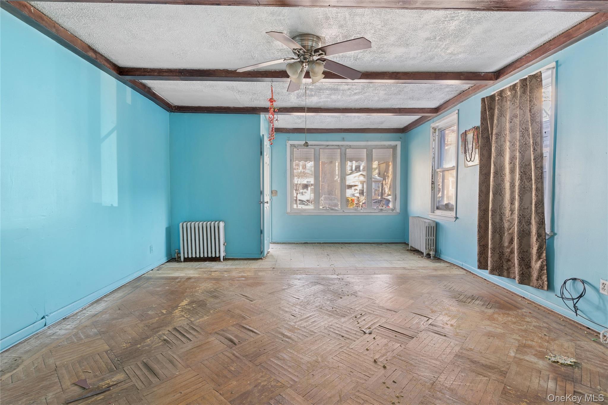 62-82 Booth Street Queens, NY 11374 - Photo 3 of 9 a view of an empty room with a window