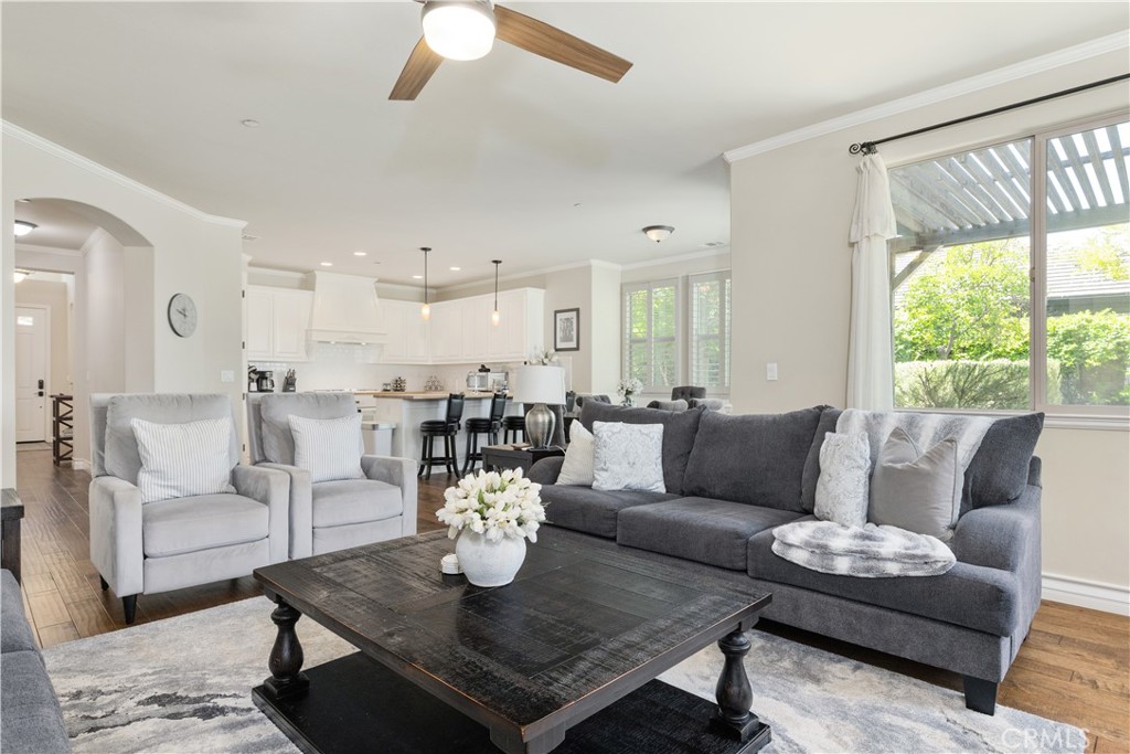 669 Red Cloud Road Paso Robles, CA 93446 - Photo 10 of 61 a living room with furniture kitchen view and a large window
