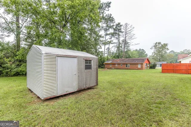 a view of outdoor space and yard