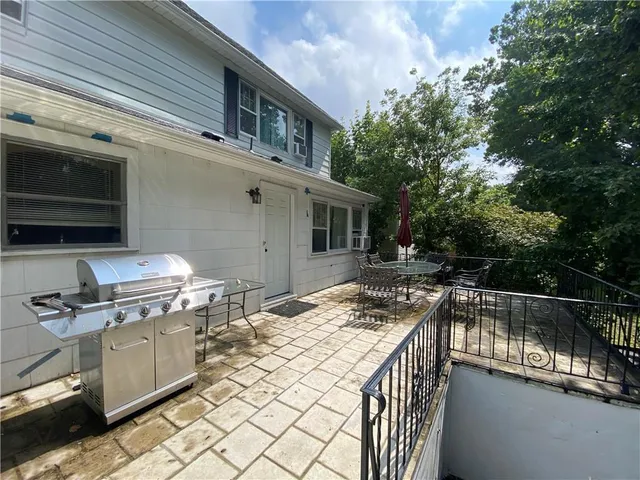 a view of a kitchen with a sink and stove