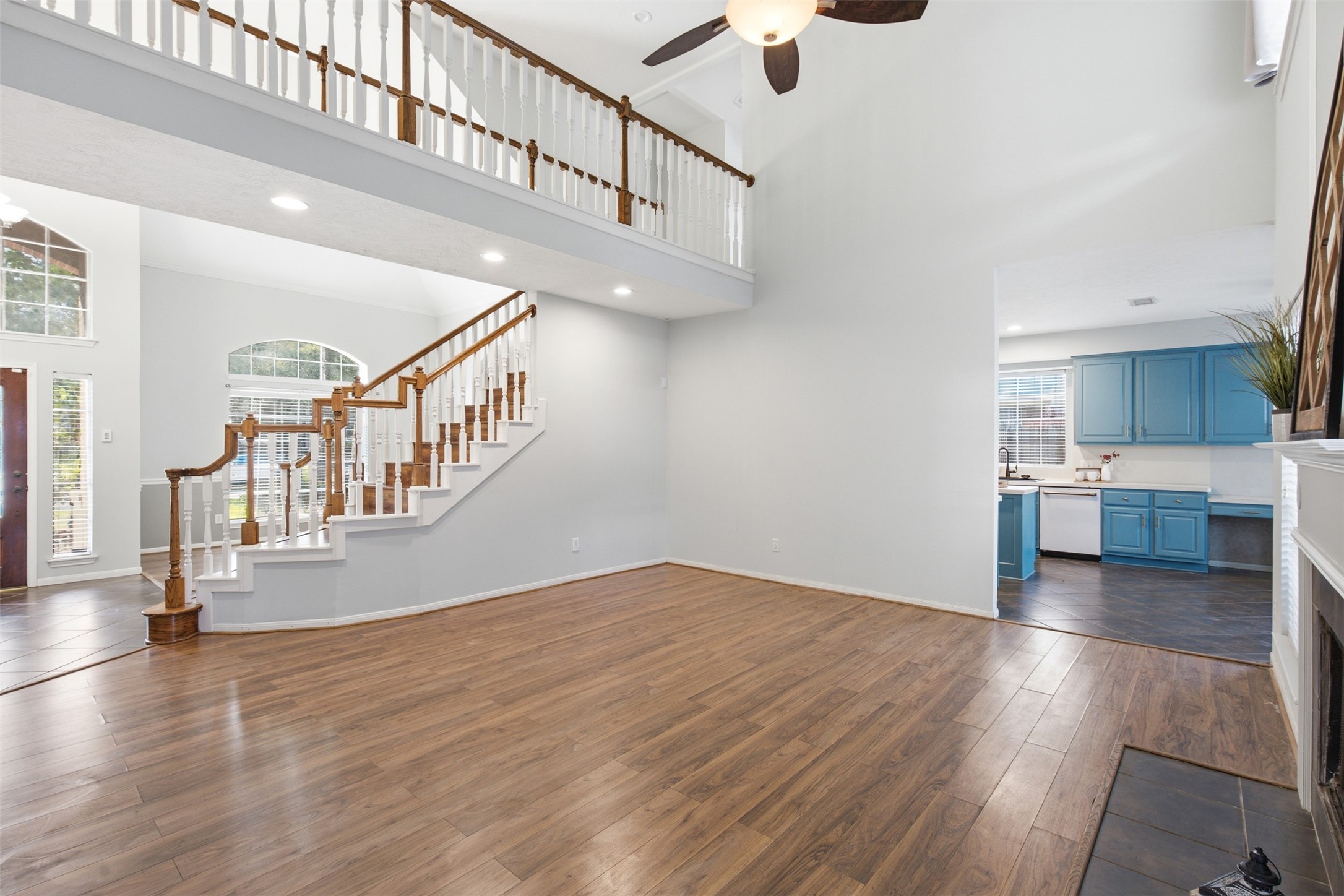 323 Magic Oaks Court Spring, TX 77388 - Photo 19 of 49 The living room is the perfect compromise of wanting dedicated rooms with wall space and the desire for an open concept.