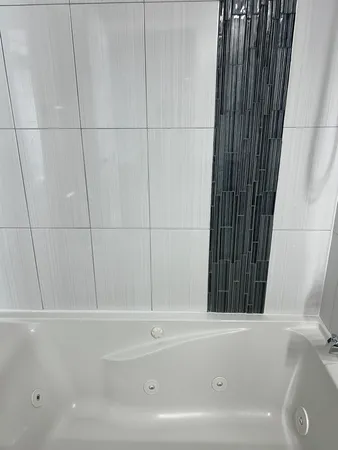 a bathroom with a bathtub