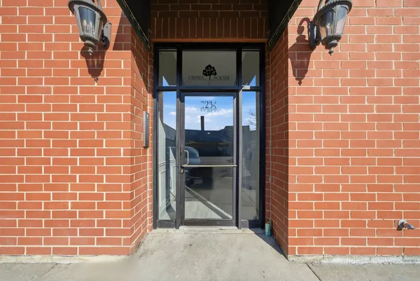 a view of a door and a window