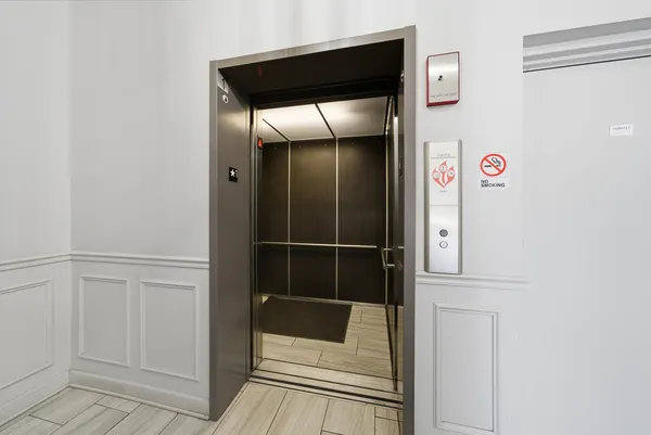 a bathroom with a shower and a sink