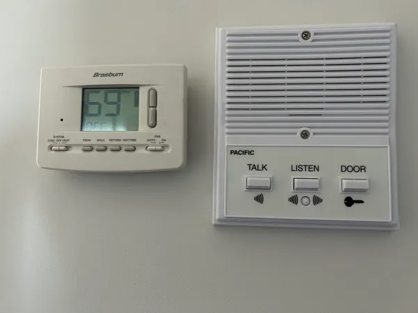 a view of kitchen with white cabinets