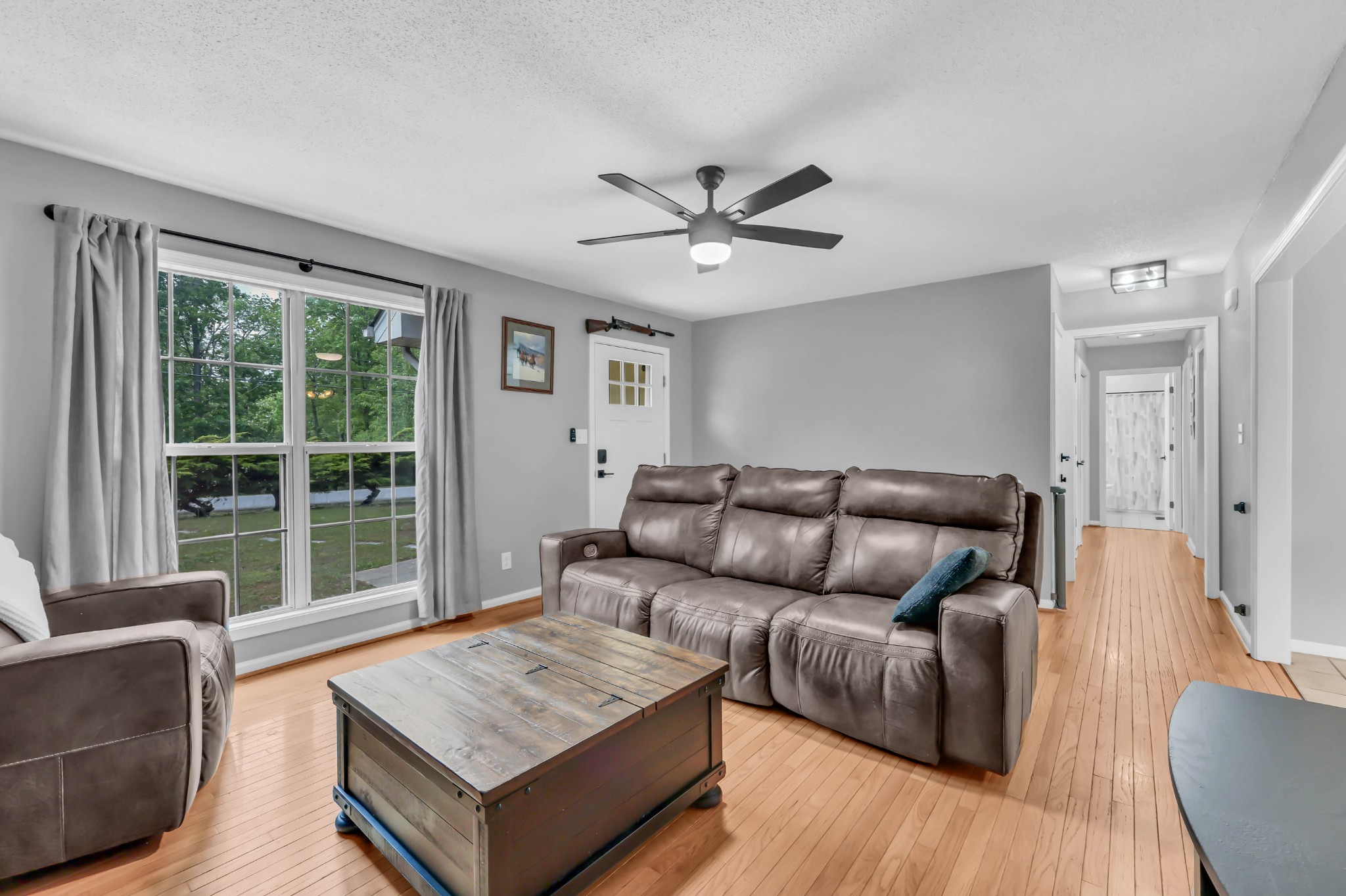 3300 Backridge Road Woodlawn, TN 37191 - Photo 11 of 42 a living room with furniture and a large window