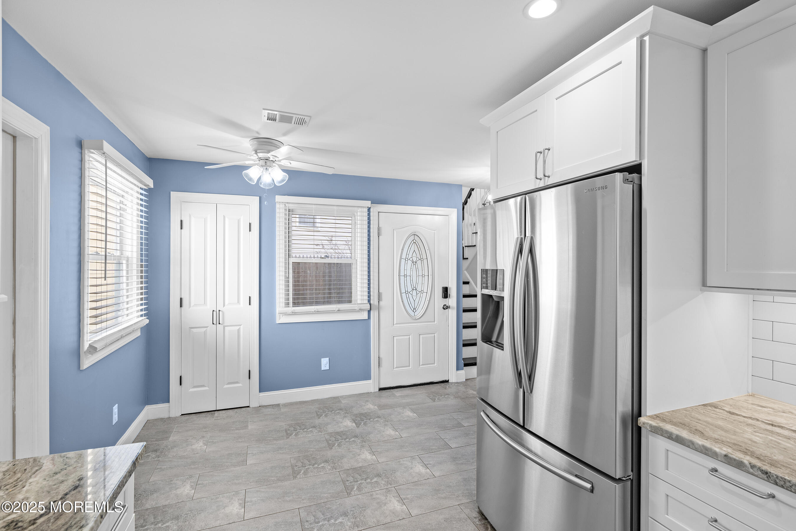 7 Longfellow Court Freehold, NJ 07728 - Photo 6 of 38 a kitchen with stainless steel appliances a refrigerator and cabinets