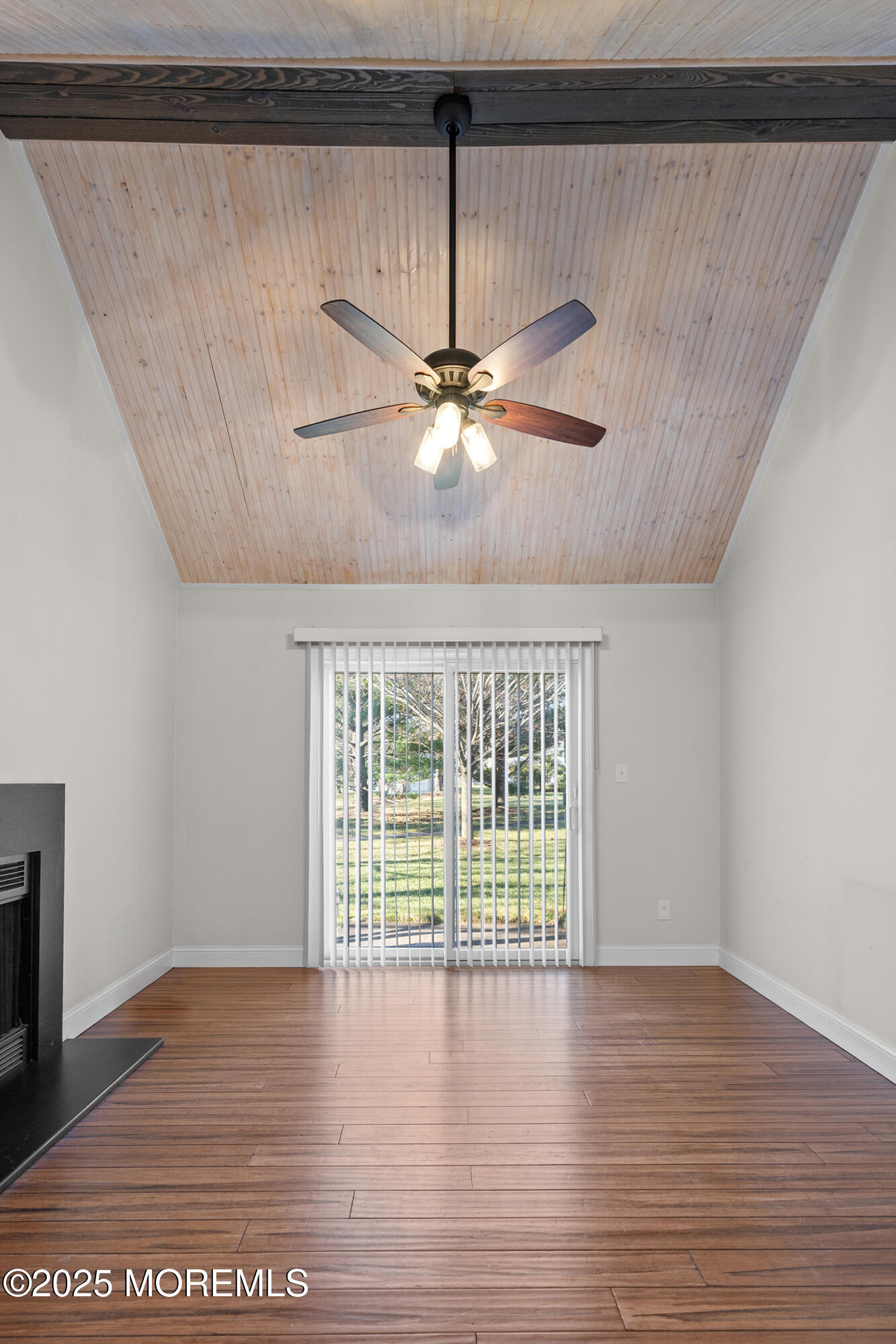7 Longfellow Court Freehold, NJ 07728 - Photo 8 of 38 a view of a livingroom with a ceiling fan and hardwood floor